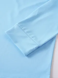 T-shirt de sport bleu clair à manches longues avec détail du poignet et tissu lisse