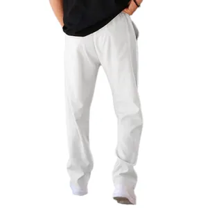 Detailed view of men's loose straight-leg white sweatpants showing casual fit and fabric