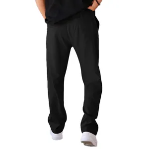 Detailed view of men's loose straight-leg black casual sweatpants and fabric texture
