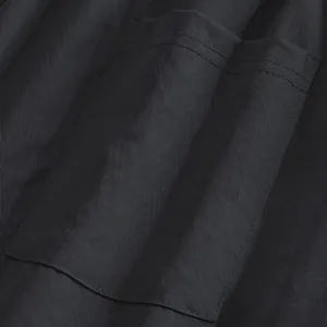 Close-up macro view showing high-quality pocket stitching on black men's casual trousers
