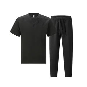 Full view of men's black heavy jacquard short-sleeve T-shirt and pants set