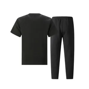 Back view of men's black heavyweight jacquard short sleeve T-shirt and pants set