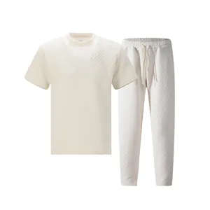 Detailed view of cream textured heavy jacquard T-shirt and pants outdoor leisure set