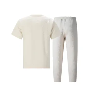 Back view of men's heavy jacquard short sleeve T-shirt and pants set in beige