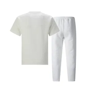 Detailed view of white heavy jacquard textured men's casual T-shirt and pants set