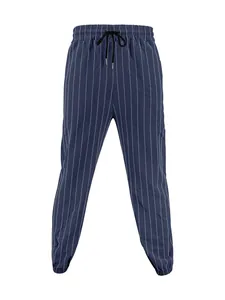 Close-up detail of men's navy blue vertical striped linen pants with drawstring