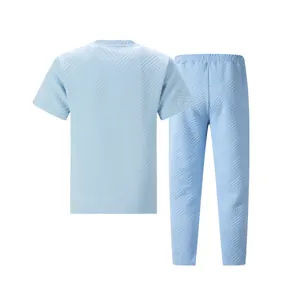Back view of light blue men's summer set with heavy jacquard texture