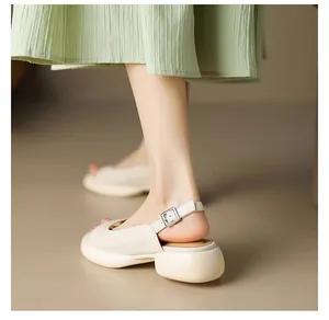 Detailed view of fashionable lightweight beige chunky heel slingback sandals for women