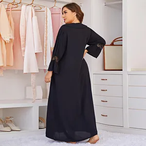 Plus size black long-sleeved nightgown with lace trim details for women.