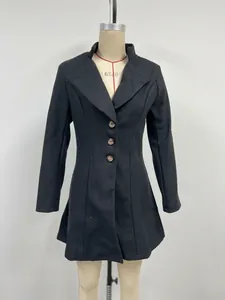 Front view of black lapel wool coat on mannequin showing detailed tailoring