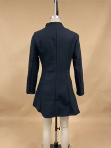 Detailed back view of solid black lapel wool coat with elegant tailored fit for women in winter