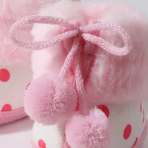 Süße rosa Babystiefel mit Kunstpelzbesatz und niedlichen Pompons für den Winterzeit