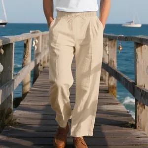 Relaxed fit men's linen blend trousers in beige color perfect for summer beach vacations