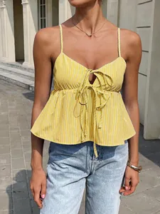 Close-up detail of a yellow striped camisole top featuring a chic tie-front knot design