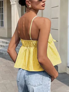 Detailed back view of a yellow and white striped summer camisole top with thin straps