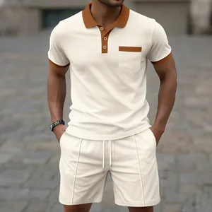 Detail of men's cream waffle knit polo and shorts set featuring brown contrast trim.
