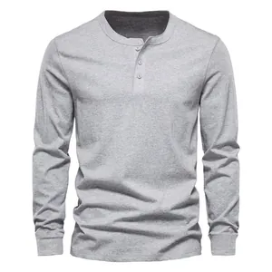 Close-up front view of a grey long-sleeve Henley shirt for men with a three-button placket