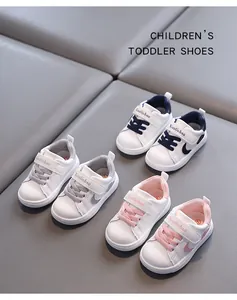 Three pairs of comfortable toddler walking shoes in navy, grey, and pink colors.