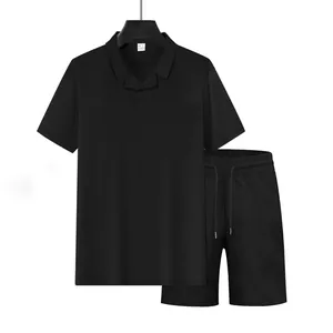 Detailed view of a black waffle knit men's summer polo shirt and matching shorts set