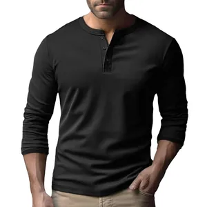 Detail view of slim fit black solid long sleeve Henley shirt for men's casual wear