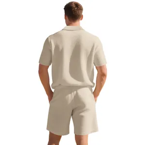 Detailed back view of men's summer beige waffle knit polo shirt and shorts casual set