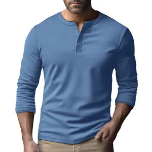Detail of men's slim fit light blue long sleeve Henley shirt with three-button placket