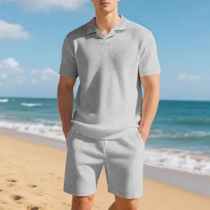 Casual men's grey waffle knit polo shirt and shorts summer beach vacation outfit