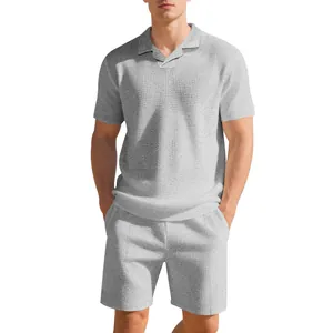 Men's casual grey waffle knit two-piece set featuring short sleeve polo shirt and shorts