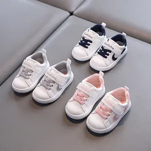 Toddler soft-sole walking shoes for 1-3 years old in waterproof white leather sneakers.