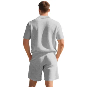 Rear view of grey waffle knit polo and shorts set for men in relaxed fit