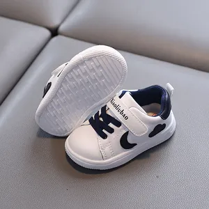 Toddler soft-sole walking shoes in waterproof white leather with moon cloud patterns