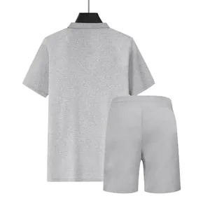 Back view of men's grey waffle knit short-sleeve polo shirt and matching shorts set
