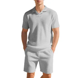 Casual men's grey waffle knit polo shirt and shorts set in a relaxed summer fit style