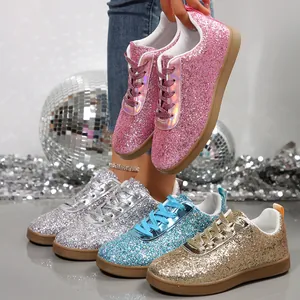 Detailed view of sparkly glitter women's flat sneakers in various colors