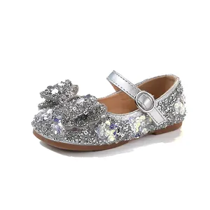 Sparkly silver glitter girls princess shoes with large sequin bow and buckled strap