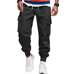 Close-up detail of heavyweight black men's cargo pants with multi-pocket design