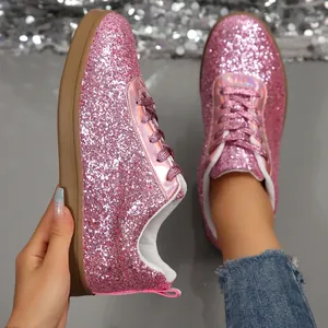 Stylish pink glitter casual sneakers with sparkling finish and comfortable rubber sole