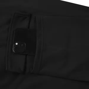 Detail showing the large functional pocket of these heavyweight black cargo pants