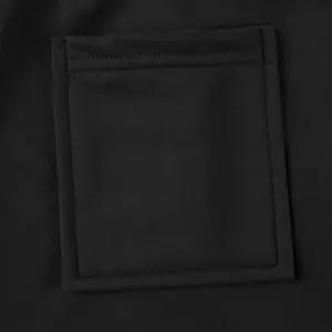 Close-up of black cargo pants pocket showing heavy knit fabric and durable stitching