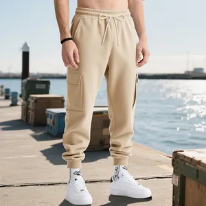 Close-up of heavyweight khaki cargo joggers for men featuring side pockets and drawstrings