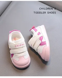 Close-up of pink and white toddler shoes with breathable mesh and Velcro straps