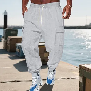 Heavyweight men's grey cargo sweatpants featuring multiple pockets for casual outdoor wear
