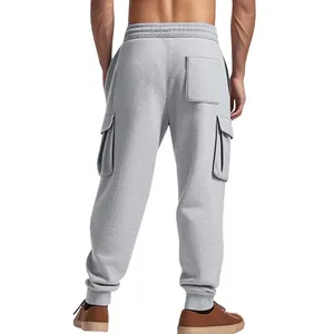 Back view of grey heavy men's cargo joggers with multiple pockets and ribbed cuffs