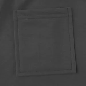 Detailed close-up showing heavy-duty fabric and square pocket on charcoal cargo pants