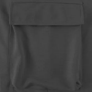 Close-up of a large cargo pocket with flap on heavyweight charcoal grey pants