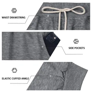 Detail view of men's grey sports cargo pants showing waist drawstring and side pockets