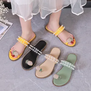 Pearl studded flat sandals with rhinestone pineapple decor in four distinct colors