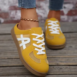 Sneaker in mesh traspirante gialle con lacci bianchi per donna stile estivo casual outdoor