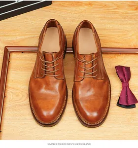 Vintage washed brown leather Goodyear welted Derby shoes for men presented from a top-down view