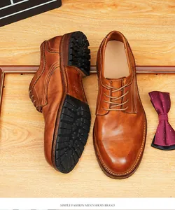 Detail view of vintage brown leather Goodyear welted Derby shoes for men